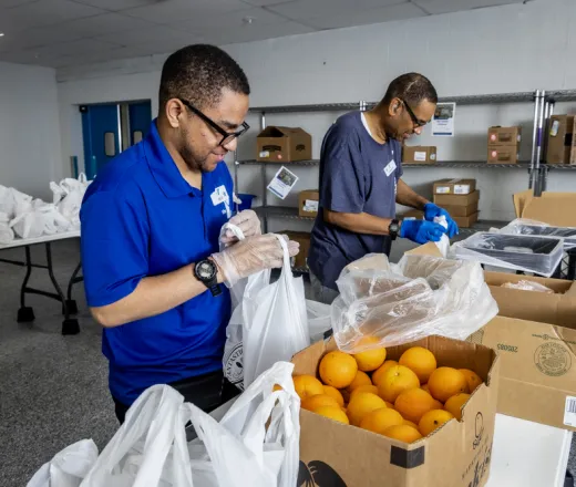 Packing oranges at J.A. Henry YMCA